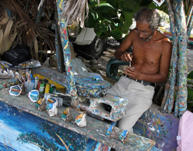 man-painting-shells.jpg